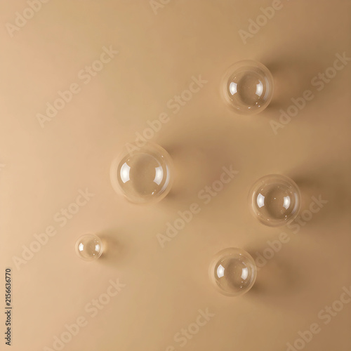 Five clear glass spheres of...