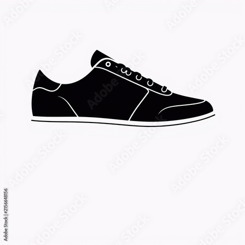 Black leather sneaker isolated on white background. Minimalist men's casual shoe with clean design and white sole for fashion and branding projects.