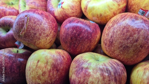 Vibrant Red and Yellow Apples Displayed in a Market for Healthy Eating and Fresh Produce Concepts