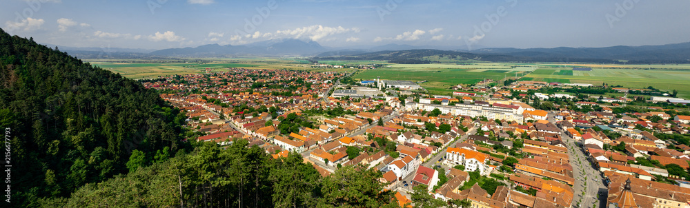 Fototapeta premium Ancient city of Rasnov in Romania. Panorama of the city from the air