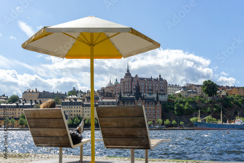 Photography Relaxing by water in Stockholm Södermalm under parasol