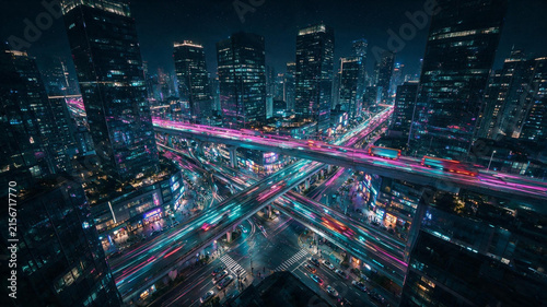 Bright futuristic city skyline illuminated at night