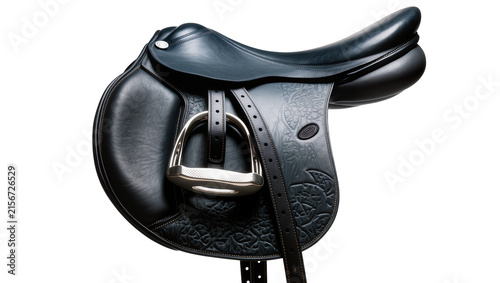Bild auf Leinwand Black leather equestrian saddle with silver stirrup embossed details, isolated o