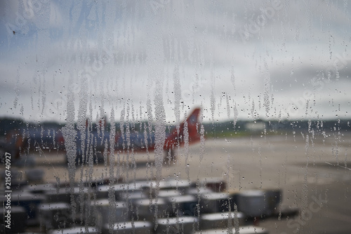 Morning Airport View Through Condensation Covered Window