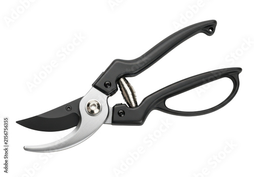 Black and silver garden pruning shears with a metal spring mechanism, isolated on a solid black background, side view of handheld bypass secateurs for gardening