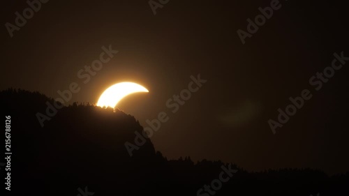 Partial Solar Eclipse at Sunset Over French Alps in 2026