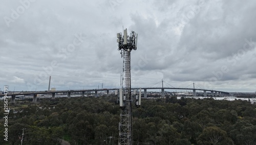 Telecommunications cell tower with West Gate Bridge in Melbourne
