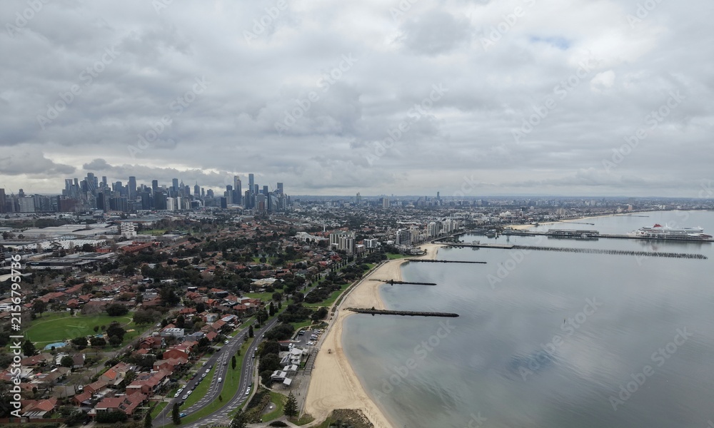 Fototapeta premium Melbourne city skyline and Port Phillip Bay aerial view