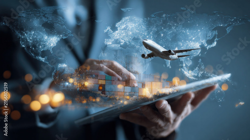 Businessperson Using Tablet with Global Cargo Transport and Worldwide Logistics Concept
