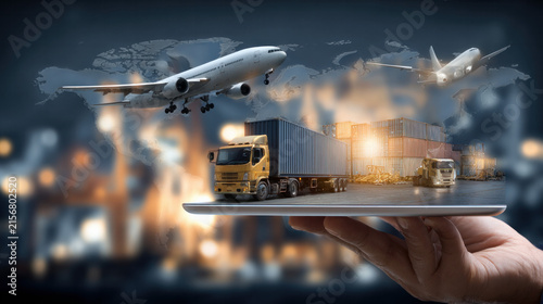 Businessperson Using Tablet with Global Cargo Transport and Worldwide Logistics Concept