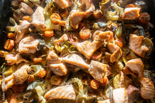 Konstfotografi Hirtshals, Denmark An oven dish with baked salmon or lax pieces with potatoes and onions and cream