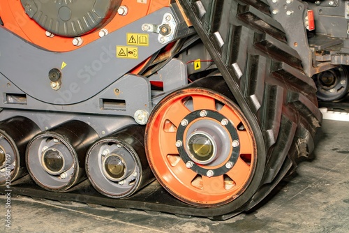 Heavy machinery tracks on a construction site during daytime hours