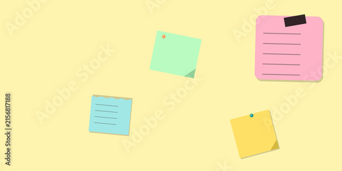Colorful sticky notes on yellow background