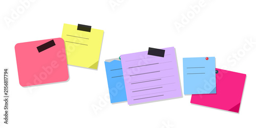 Colorful sticky notes with clip pins on a flat surface