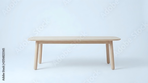 Minimalist wooden dining table with tapered legs on white background