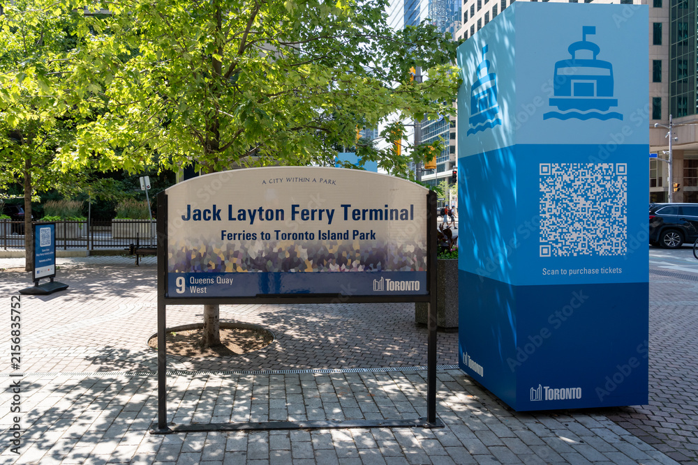 Fototapeta premium Toronto, Ontario, Canada - August 13, 2026: The entrance to Jack Layton Ferry Terminal on Queens Quay West in Toronto, Ontario, Canada.