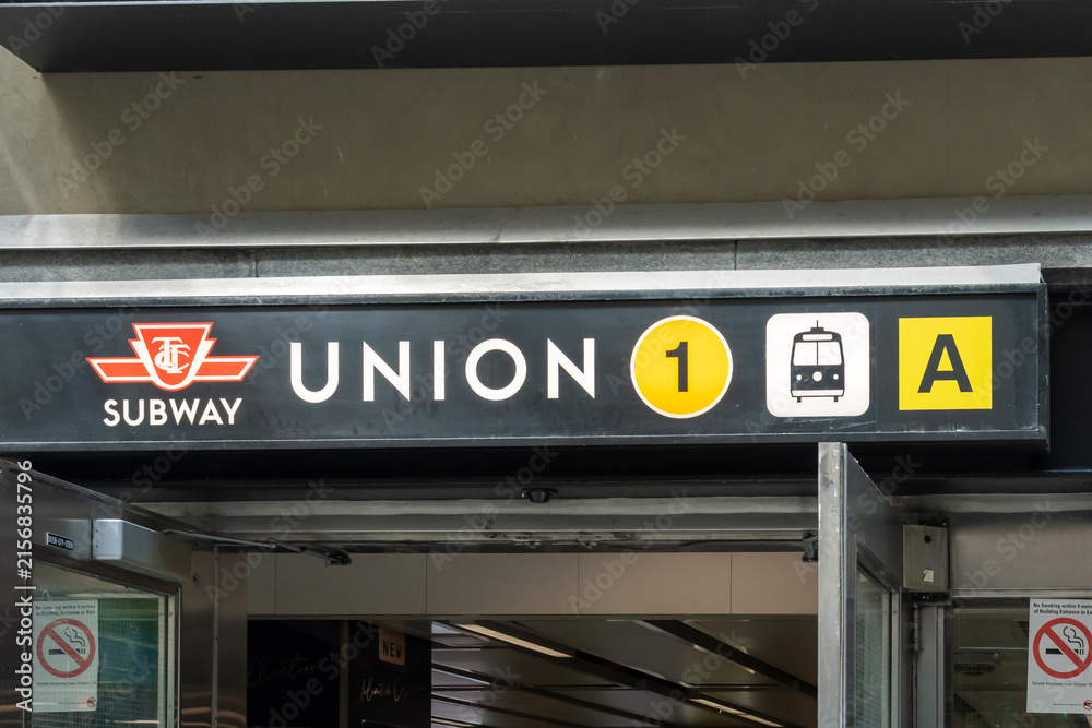 Fototapeta premium Toronto, Ontario, Canada - August 13, 2026: Entrance sign for Union Station Subway on Line 1 Yonge University of the Toronto Transit Commission (TTC) in Toronto, Ontario, Canada.