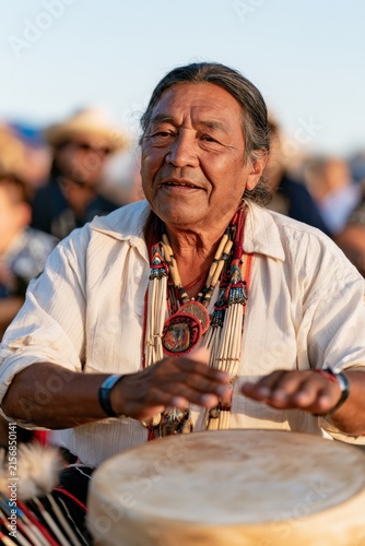 Cultural heritage celebration featuring traditional drum performance,National Native American Heritage Month