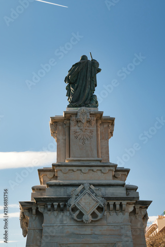The monument depicted in the image is the statue of Roger de Llúria, the renowned admiral of the Crown of Aragon, located at the end of the Rambla Nova in Tarragona, Spain.