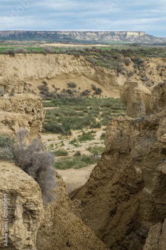 Ravine opening into a valley, semi-desert Bardenas Reales, Spain
