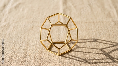 Brass Dodecahedron On Linen Surface For Back To School Education Concept