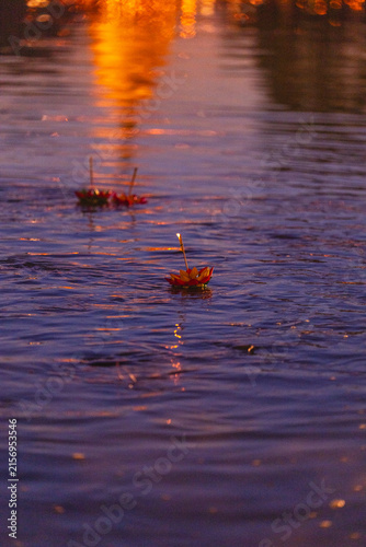 Картината върху платно Water reflection candle flower river floating ritual ceremony offering dusk Two