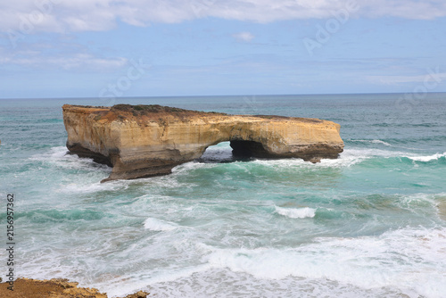 Natural Rock Arch Formation with Crashing Waves on Australian Coast