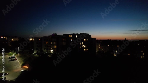 High Angle Night Footage of Illuminated Buildings and Roads with Traffic at Best Tourist Attraction Destination of England at Bournemouth City with Sandy Beach and Ocean of Great Britain, 
