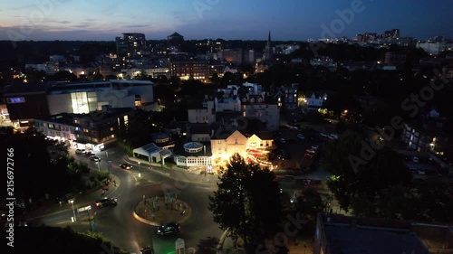 High Angle Night Footage of Illuminated Buildings and Roads with Traffic at Best Tourist Attraction Destination of England at Bournemouth City with Sandy Beach and Ocean of Great Britain, 