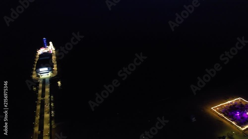 High Angle Night Footage of Illuminated Buildings and Roads with Traffic at Best Tourist Attraction Destination of England at Bournemouth City with Sandy Beach and Ocean of Great Britain, 