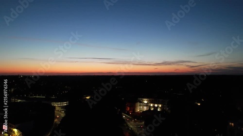 High Angle Night Footage of Illuminated Buildings and Roads with Traffic at Best Tourist Attraction Destination of England at Bournemouth City with Sandy Beach and Ocean of Great Britain, 