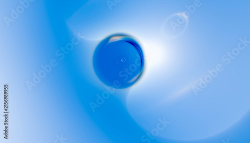 Blue glossy abstract sphere with light reflections on smooth