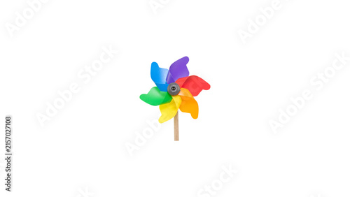 Fotografie Colorful rainbow pinwheel wind spinner isolated on white background