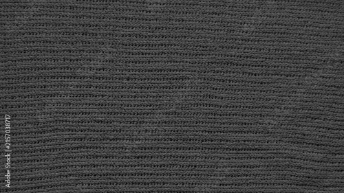 charcoal knit fabric texture background with cozy wool stitches inspiring winter web design and advertising backdrops