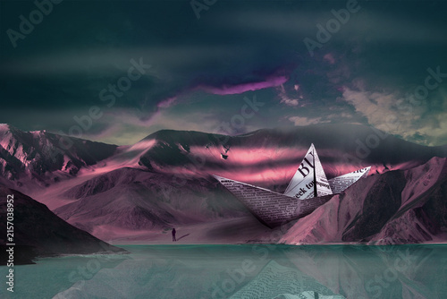 Quadro su tela A surreal mountain landscape with a paper boat floating above a turquoise lake beneath dark skies