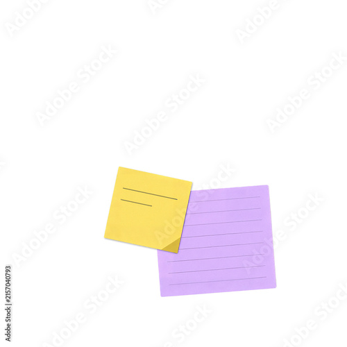 Two colorful sticky notes with dotted grid pattern