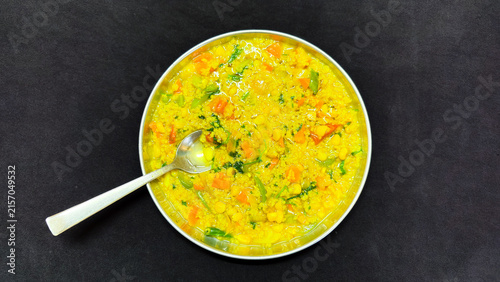 Homemade Indian Khichdi With Lentils Rice And Colorful Mixed Vegetables