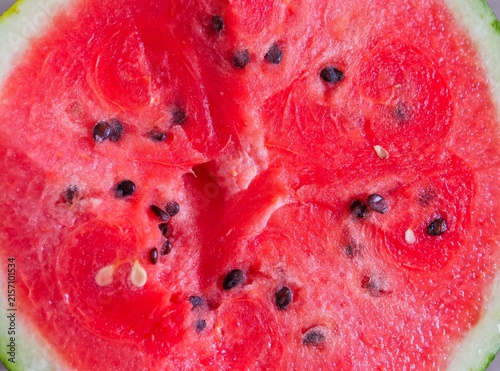 Macro Cross-Section Texture of Vibrant Red Watermelon Flesh and Seeds