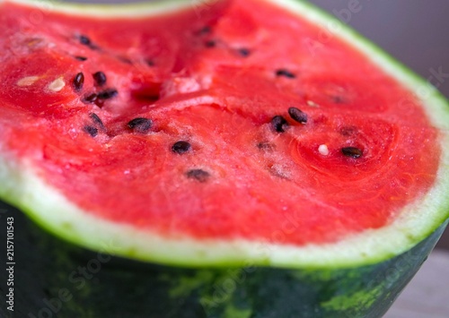 Close-Up of a Fresh Juicy Watermelon Half with Vibrant Red Flesh and Green Rind