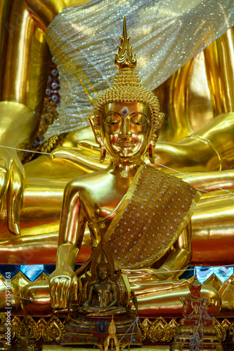 Golden Buddha Statue in Bhumisparsha Mudra at Thai Buddhist Temple