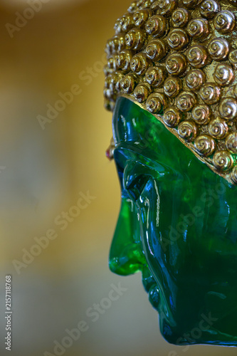 Close-Up Profile of Emerald Buddha Replica at Wat San Pa Yang Luang, Lamphun
