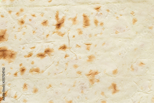 Konstfotografi A close-up image of thin lavash bread texture, related to bread, baking, food