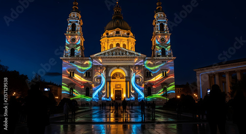 Illuminated architecture displaying artistic light projections at night