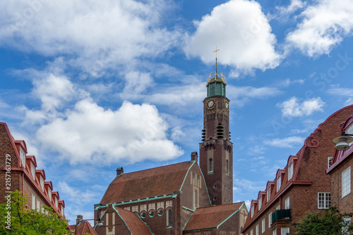 Canvastavla Engelbrekt Church tower and nave against blue sky