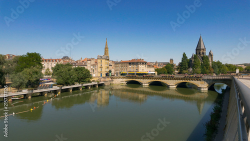 Fotografie Metz city skyline and Temple Neuf reflecting in the Moselle River