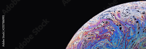 Obraz na płótnie Painterly soap bubble surface with vibrant magenta, turquoise and indigo ridges, full of motion and intricate microstructure