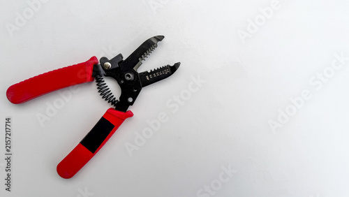 Canvas Print Red wire cutters tool isolated on a clean white background.
