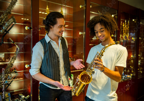 Photography Choosing a Golden Saxophone.