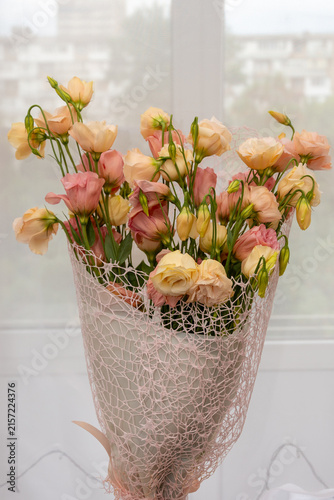 Arrangement of beautiful Eustoma flowers background