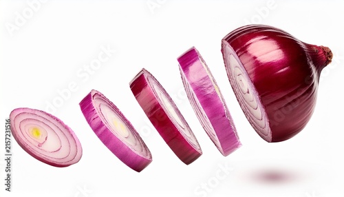 sliced red onions fallingnon a white background